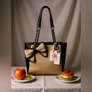 Jessica Simpson “Scarlett” Black & Gold Straw Tote with Bow Accent